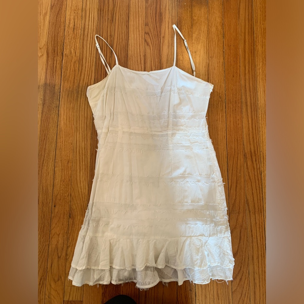 White ruffle mini dress
